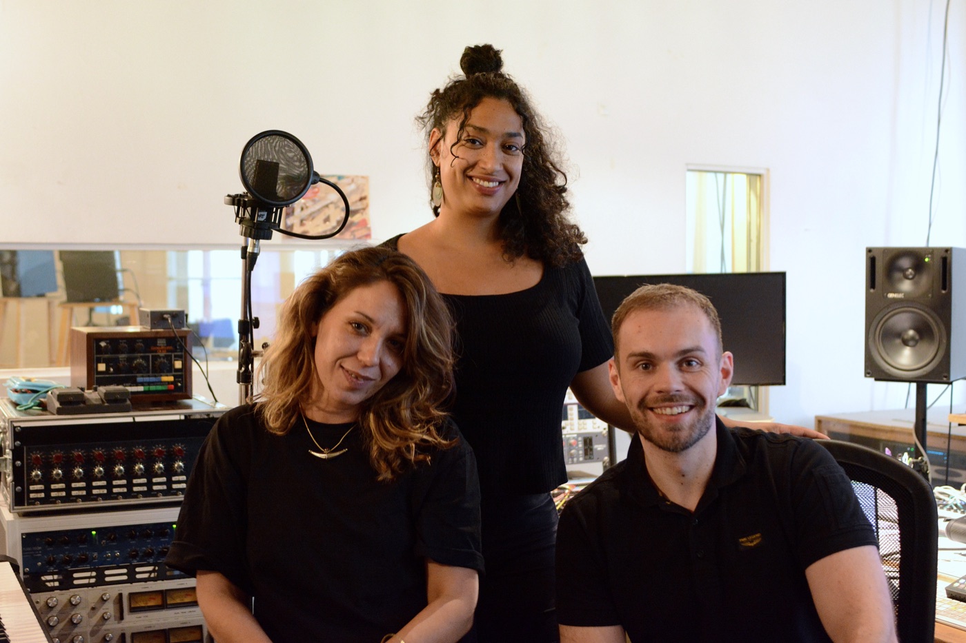 Marc and two collaborators posing together in the recording studio
